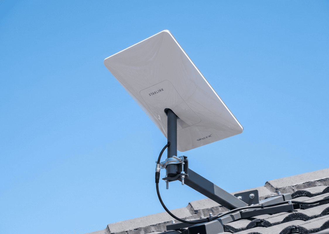 Starlink installation dish mounted on Sunshine Coast residential rooftop clear sky, Brocky's TV