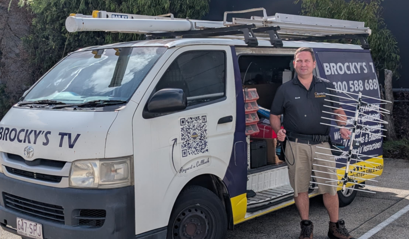 Local TV technician Sunshine Coast with service van and digital TV antenna