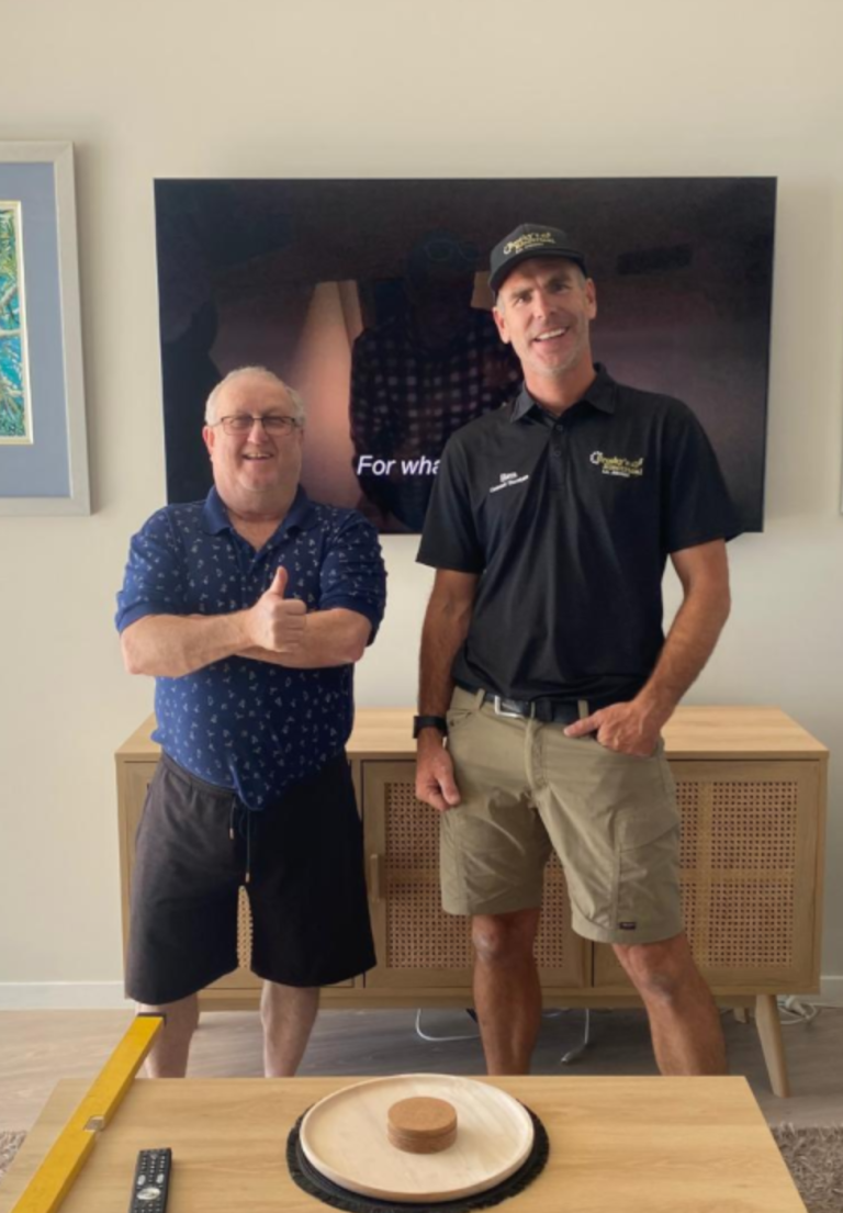 Happy customer after professional TV antenna installation in Sunshine Coast