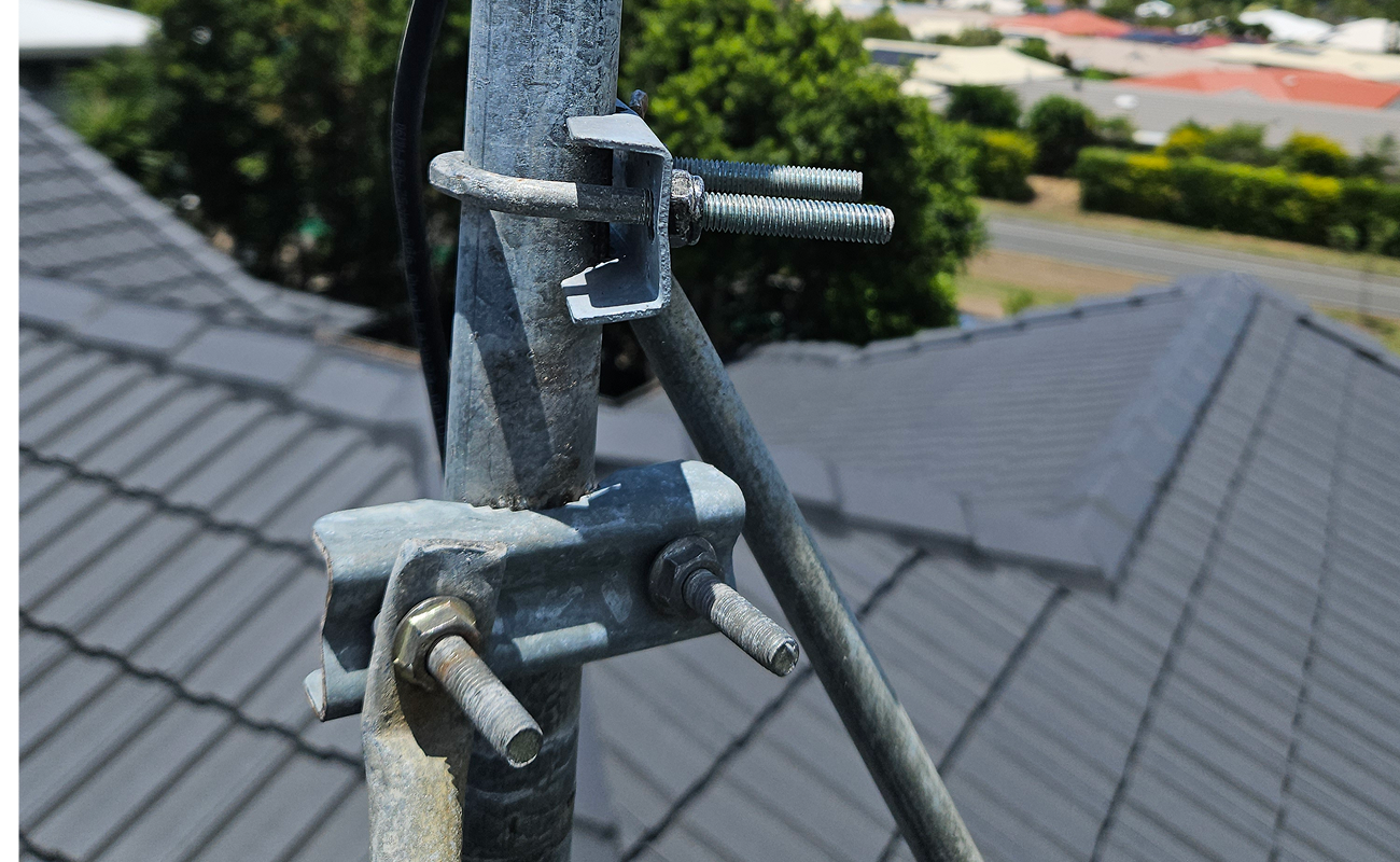 New TV antenna mount installed securely on roof